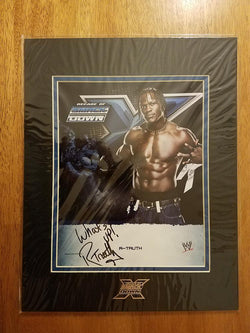 WWE AUTHENTIC DECADE OF SMACKDOWN 11x14 MATTED R-TRUTH AUTOGRAPH